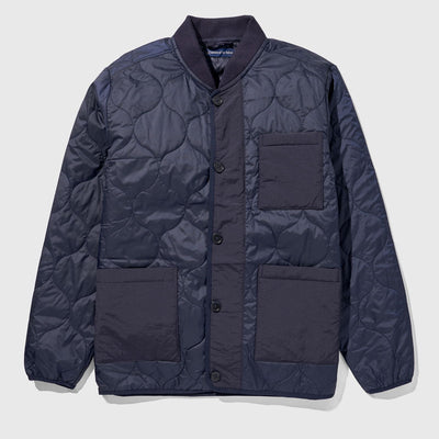 Night Sky Bison Ultralight Liner Jacket (Flat-lay): Navy quilted button-front jacket with ribbed collar and three patch pockets
