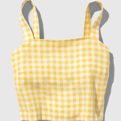 Cream Gold Linen Cropped Tank (Flat-lay): Yellow and white gingham cropped tank top with wide shoulder straps