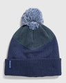 NAVY Recycled Chevron Pom Beanie (Flat-lay): Navy knit beanie with teal chevron panel, pom-pom, and folded cuff