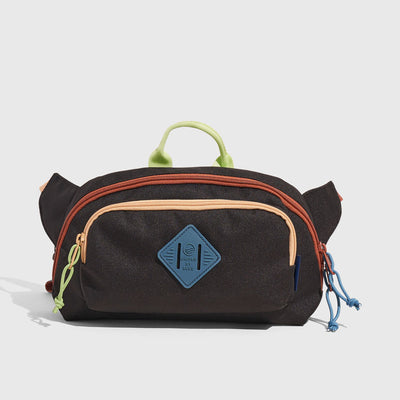 Black Multi (R)evolution™ 3L Utility Fanny Pack (Front): Dark brown fanny pack with colorful zippers, rope pulls, and blue logo patch