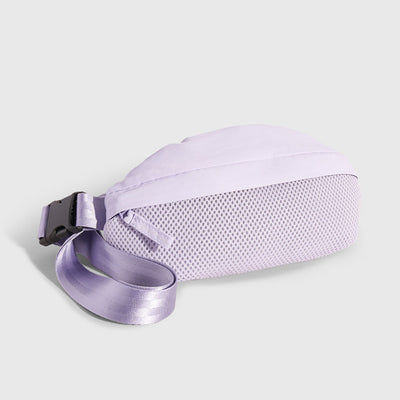 Lavender (Re)active™ 1L Fanny Pack (Angle): Lavender fanny pack showing mesh bottom panel and adjustable buckle strap