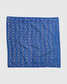 Lagoon Organic Bandana (Flat-lay): Royal blue bandana with scattered multicolor shapes and brand text border