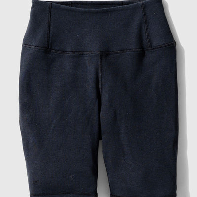 Black EcoKnit™ Ribbed Bike Short (Flat-lay): Dark navy ribbed bike shorts with wide waistband and side pockets