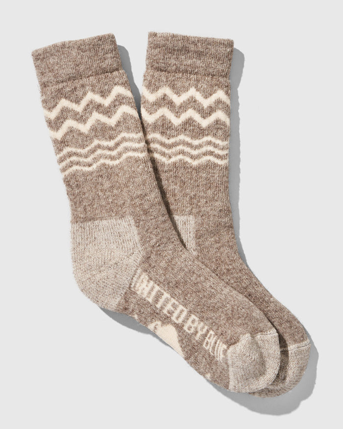 Natural The Ultimate Bison Wool Sock (Flat-lay): Heathered tan crew socks with cream zigzag stripe pattern on shaft